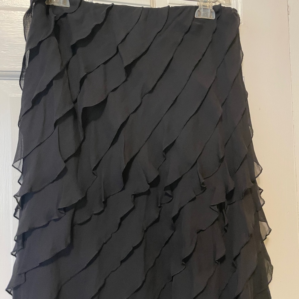 Silk ruffle skirt in black from Talbots Size 6 but elasticized waist.